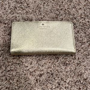Kate Spade Gold wallet. never used.